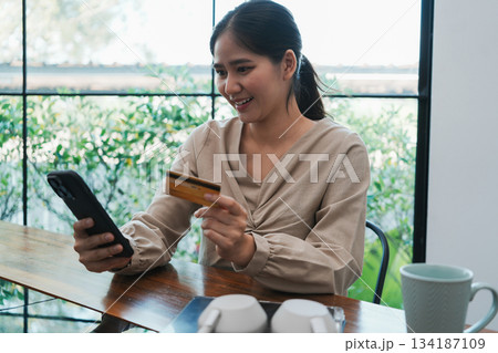 Overjoyed businesswoman happy for successful work. 134187109