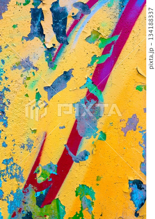 Colorful Peeling Paint Texture with Vivid Yellow, Blue, Red for 90s Grunge Aesthetic Colorful Peeling Paint Texture with Vivid Yellow, Blue, Red for 90s Grunge Aesthetic 134188337