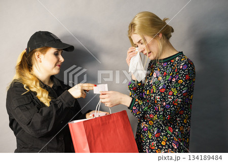 Security guard and shoplifter. 134189484