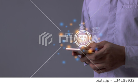 Young Man Using Smartphone For Online shopping, Mobile payment, Online payment, Digital, Bank account phone, Mobile banking payment concept 134189932