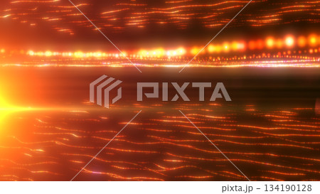 Shimmering golden glowing surface made of light particles forming futuristic energy waves Shimmering golden glowing surface made of light particles forming futuristic energy waves 134190128