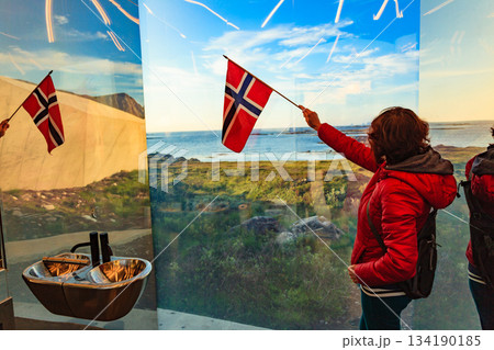 Tourist with norwegian flag in mirrored toilet, Andoy Norway Tourist with norwegian flag in mirrored toilet, Andoy Norway 134190185