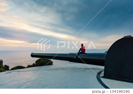 Tourist woman at Battery de Castillitos in Spain Tourist woman at Battery de Castillitos in Spain 134190190