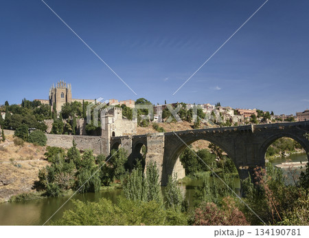 san martin bridge on tagus river in old town toledo spain 134190781
