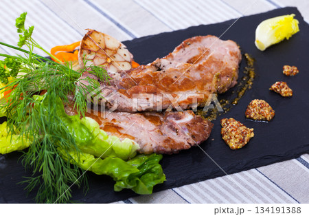 Grilled pork with greens Grilled pork with greens 134191388