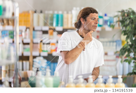 Adult man chooses prescription medications 134191539