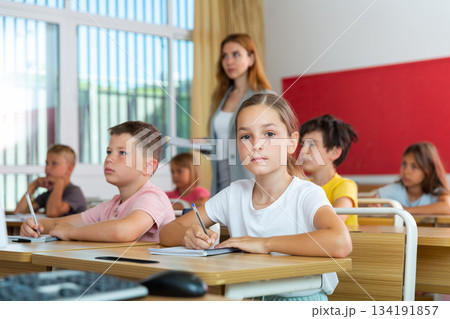 Kids studying in classroom 134191857