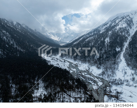 Beautiful high altitude snow capped mountain and forest in Tibet, China Beautiful high altitude snow capped mountain and forest in Tibet, China 134194044