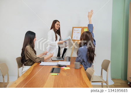 Busy office women work diligently, people meet for collaborative team market analysis presenting data and discussing strategy fostering productive work environment. Busy office women work diligently, people meet for collaborative team market analysis presenting data and discussing strategy fostering productive work environment. 134195685