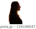 Silhouette of young woman looking up thoughtfully on white background 134196647