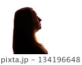 Silhouette of young woman looking up thoughtfully on white background 134196648