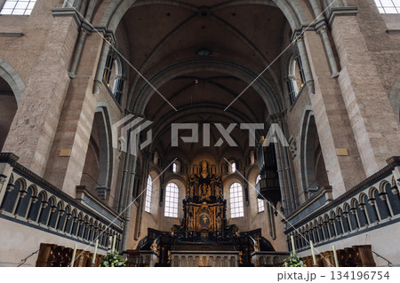 Interior view High Cathedral ceiling Saint Peter german Trier Dome. Architecture detail ornament sculptures angels saints ornate floral motifs radial composition. Interior view High Cathedral ceiling Saint Peter german Trier Dome. Architecture detail ornament sculptures angels saints ornate floral motifs radial composition. 134196754