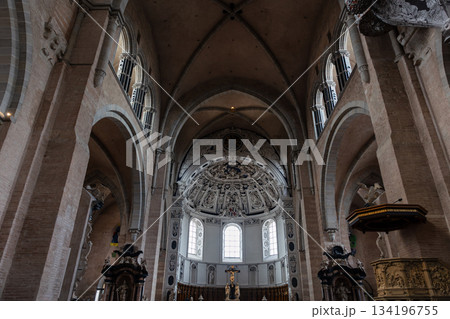 Interior view High Cathedral ceiling Saint Peter german Trier Dome. Architecture detail ornament sculptures angels saints ornate floral motifs radial composition. Interior view High Cathedral ceiling Saint Peter german Trier Dome. Architecture detail ornament sculptures angels saints ornate floral motifs radial composition. 134196755