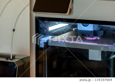 3d printer printing an object on the tray with pla filament, corn starch, non-waterproof filament 134197664