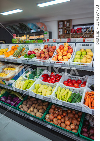 Fresh fruits and vegetables displayed in grocery store Fresh fruits and vegetables displayed in grocery store 134197733