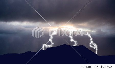 Dramatic landscape of a thunderstorm in the field. Tornadoes and strikes of lightning with a dark sky background. Extreme weather background 134197792