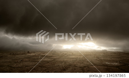 Dramatic cloudscape hovering over a barren and cracked landscape. Abstract background Dramatic cloudscape hovering over a barren and cracked landscape. Abstract background 134197865