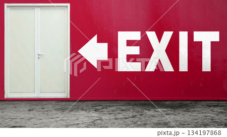 White exit sign with an arrow pointing left on a red wall, next to a double door. Concept of emergency exit, safety, escape, or direction White exit sign with an arrow pointing left on a red wall, next to a double door. Concept of emergency exit, safety, escape, or direction 134197868