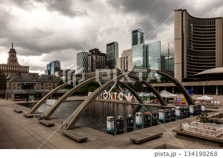 TORONTO, CANADA - May, 2025: View of Toronto Sign on Nathan Phillips Square, in Toronto, City Hall 134198268
