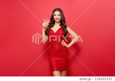 Beautiful woman with glass of champagne Beautiful woman with glass of champagne 134203147