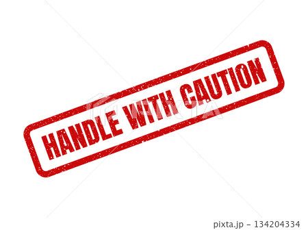 Distressed red rectangle stamp vector featuring text HANDLE WITH CAUTION for general safety instructions 134204334
