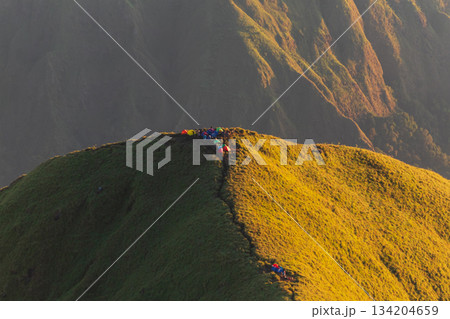 Colorful tents camping high on Pergasingan Hill ridge. Colorful tents camping high on Pergasingan Hill ridge. 134204659