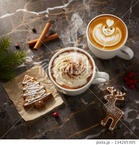 two cups of hot christmas drink and a gingerbread cookie on a marble table 134205305