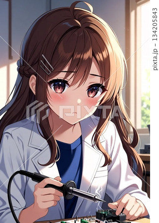 はんだごてを使っている女の子 134205843