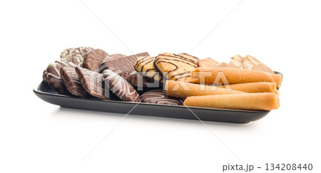 Christmas sweet and cookies on plate  isolated on white background. 134208440