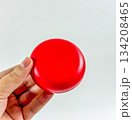 Red Cushion Compact in Hand Red Cushion Compact in Hand 134208465