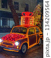 Festive Car Decorated With Christmas Lights Festive Car Decorated With Christmas Lights 134209564