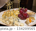 Cheese Plate with Grapes and Honey Cheese Plate with Grapes and Honey 134209565