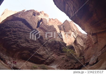 The Tianshan Grand Canyon, or Kesileya Grand Canyon, is a stunning natural feature in Xinjiang, China characterized by its distinctive red canyons formed by millions of years of wind and rain erosion. 134213517