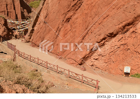 The Tianshan Grand Canyon, or Kesileya Grand Canyon, is a stunning natural feature in Xinjiang, China characterized by its distinctive red canyons formed by millions of years of wind and rain erosion. 134213533