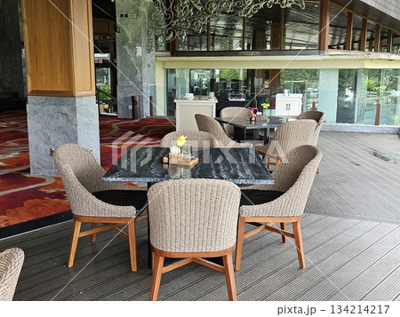 this is chair and table at a restaurant. 134214217