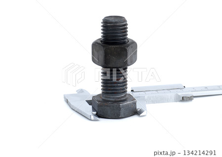 Metal Bolt with Nut Measured by Vernier Caliper on White Background 134214291