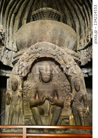 Buddha statue in Cave No.10 of the Buddhist temple at Ellora Caves. Elora a UNESCO World Heritage Site, is one of the world's largest collections of rock-cut temples and shrines. 134214553