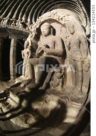 Buddha statue in Cave No.10 of the Buddhist temple at Ellora Caves. Elora a UNESCO World Heritage Site, is one of the world's largest collections of rock-cut temples and shrines. Buddha statue in Cave No.10 of the Buddhist temple at Ellora Caves. Elora a UNESCO World Heritage Site, is one of the world's largest collections of rock-cut temples and shrines. 134214555