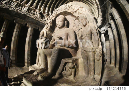 Buddha statue in Cave No.10 of the Buddhist temple at Ellora Caves. Elora a UNESCO World Heritage Site, is one of the world's largest collections of rock-cut temples and shrines. 134214556