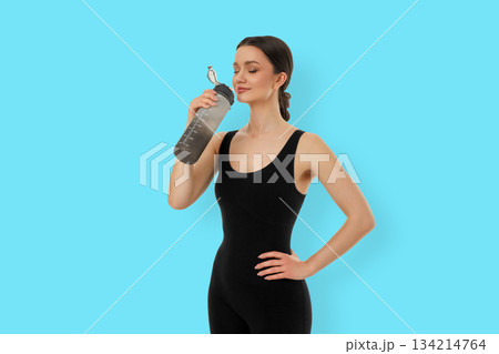Yoga session with water bottle in fit lifestyle background Yoga session with water bottle in fit lifestyle background 134214764