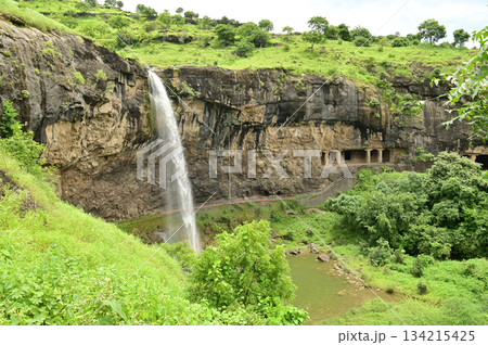 Waterfalls flowing through the valley near the Ellora, a UNESCO World Heritage Site, is one of the world's largest collections of rock-cut temples and shrines, containing Hindu, Buddhist and Jain art. Waterfalls flowing through the valley near the Ellora, a UNESCO World Heritage Site, is one of the world's largest collections of rock-cut temples and shrines, containing Hindu, Buddhist and Jain art. 134215425