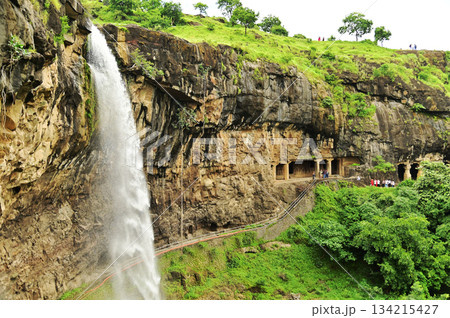 Waterfalls flowing through the valley near the Ellora, a UNESCO World Heritage Site, is one of the world's largest collections of rock-cut temples and shrines, containing Hindu, Buddhist and Jain art. Waterfalls flowing through the valley near the Ellora, a UNESCO World Heritage Site, is one of the world's largest collections of rock-cut temples and shrines, containing Hindu, Buddhist and Jain art. 134215427
