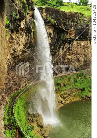 Waterfalls flowing through the valley near the Ellora, a UNESCO World Heritage Site, is one of the world's largest collections of rock-cut temples and shrines, containing Hindu, Buddhist and Jain art. Waterfalls flowing through the valley near the Ellora, a UNESCO World Heritage Site, is one of the world's largest collections of rock-cut temples and shrines, containing Hindu, Buddhist and Jain art. 134215428