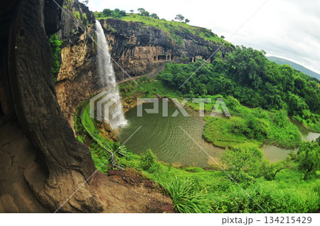 Waterfalls flowing through the valley near the Ellora, a UNESCO World Heritage Site, is one of the world's largest collections of rock-cut temples and shrines, containing Hindu, Buddhist and Jain art. Waterfalls flowing through the valley near the Ellora, a UNESCO World Heritage Site, is one of the world's largest collections of rock-cut temples and shrines, containing Hindu, Buddhist and Jain art. 134215429