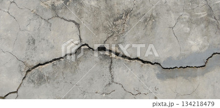Weathered and cracked concrete surface Weathered and cracked concrete surface 134218479