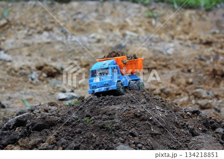 excavator digging in the mud excavator digging in the mud 134218851