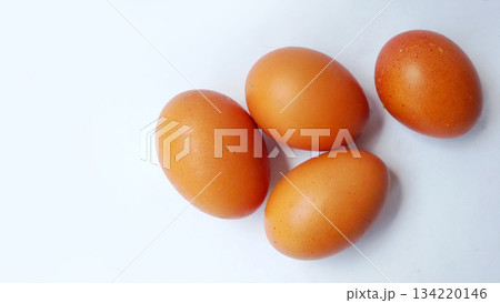 Fresh Brown Eggs on White Background 134220146