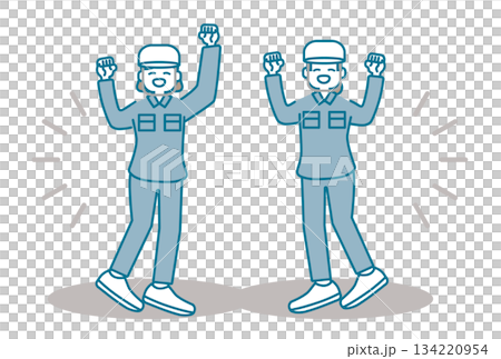 Women in work clothes wearing helmets enthusiastically pumping their fists Women in work clothes wearing helmets enthusiastically pumping their fists 134220954