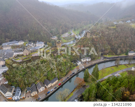 Esch-Sur-Sure, Wiltz, Grand Duche De Luxembourg, December 7, 2025, Cliffside Row Houses By River Esch-Sur-Sure, Wiltz, Grand Duche De Luxembourg, December 7, 2025, Cliffside Row Houses By River 134221090