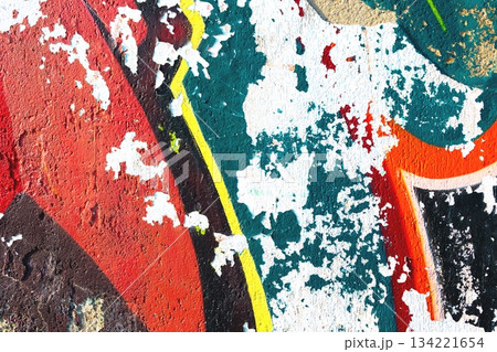 Abstract Textured Paint Peeling Wall with Vibrant Colors, Urban Grunge Style 134221654